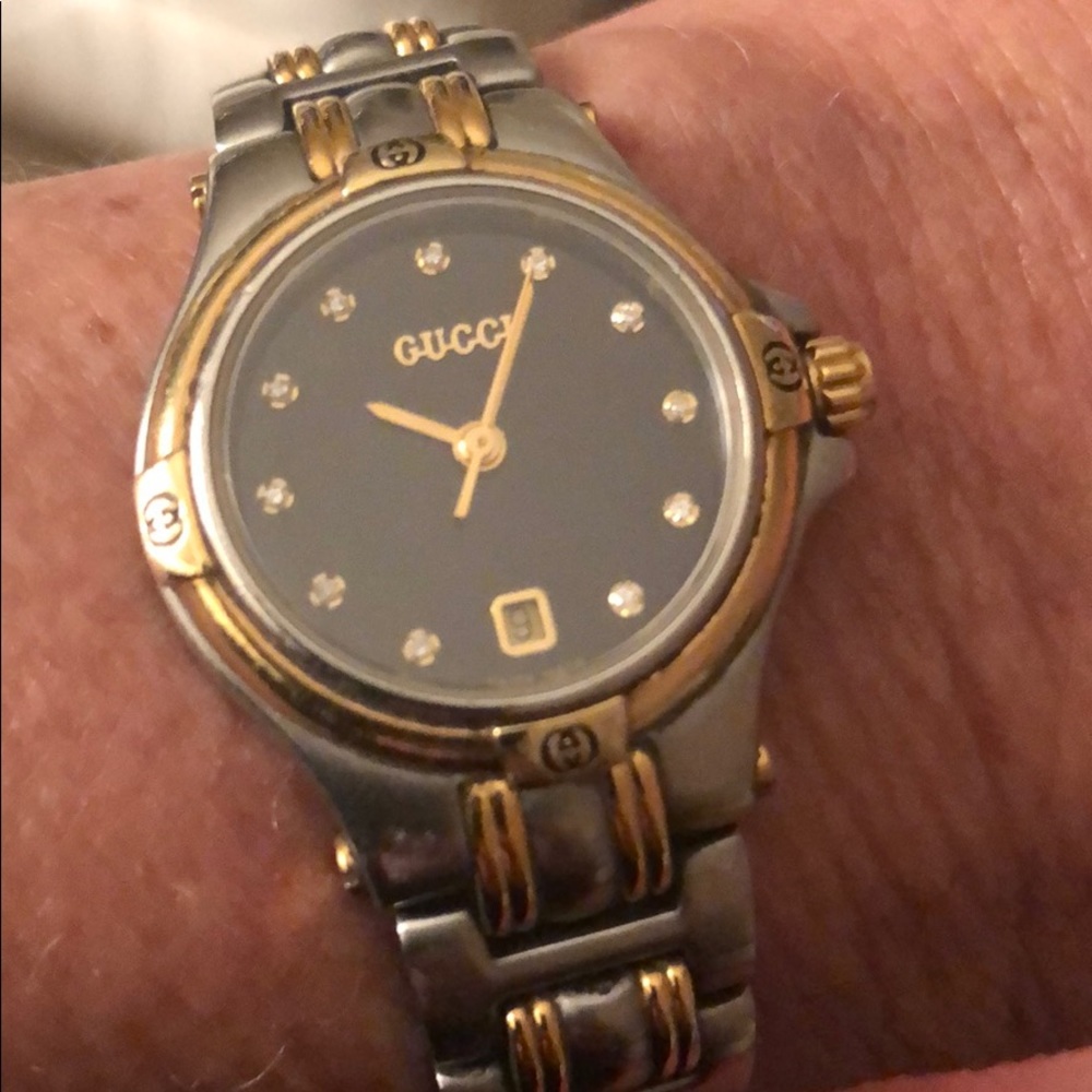 Gucci with Diamond face